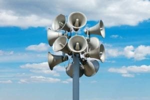 Speakers mounted on a pole