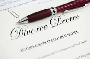 Divorce Decree with a pen on it.