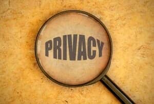 Word "Privacy" under a magnifying glass.