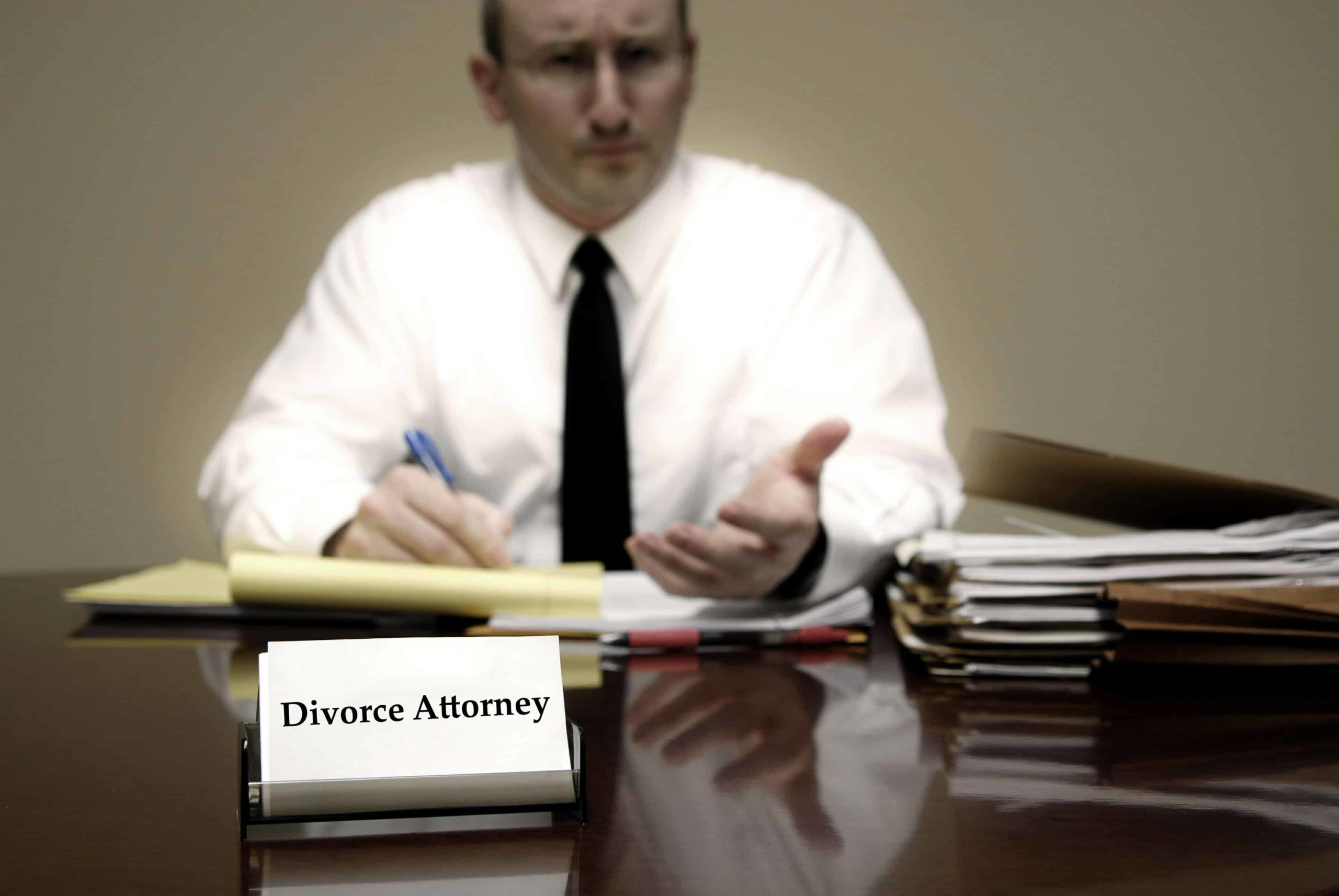 Divorce attorney advising client.