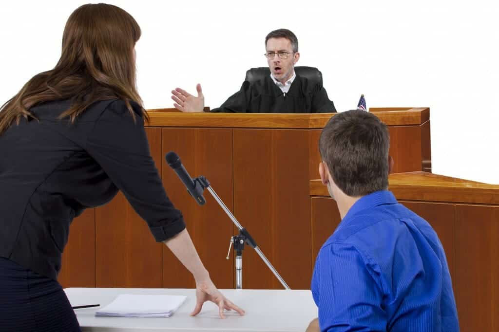Custody battle in court with lawyer speaking to a judge in the courtroom