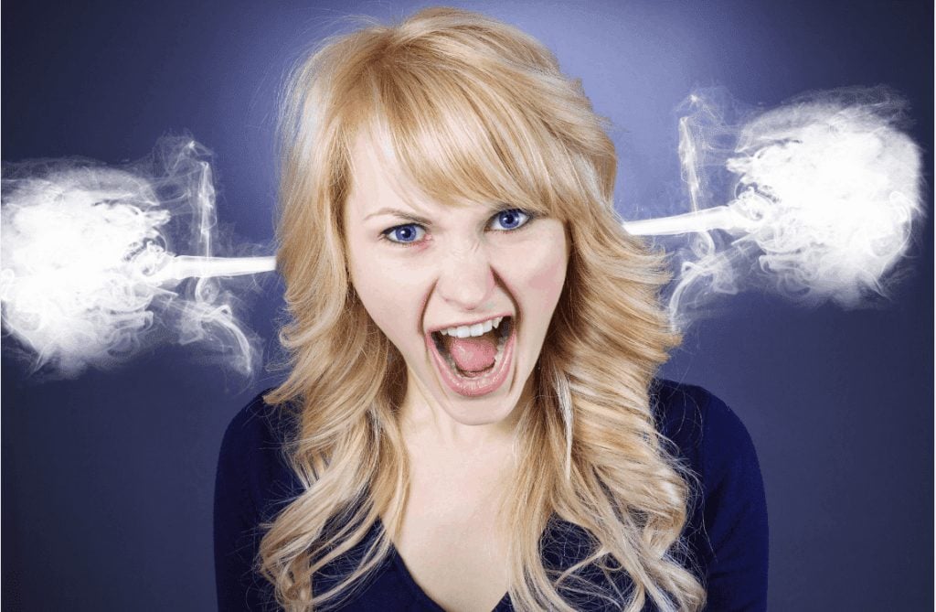 Screaming woman with steam coming out of her ears.