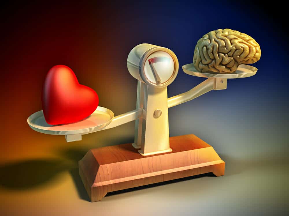 Head and heart on scales.