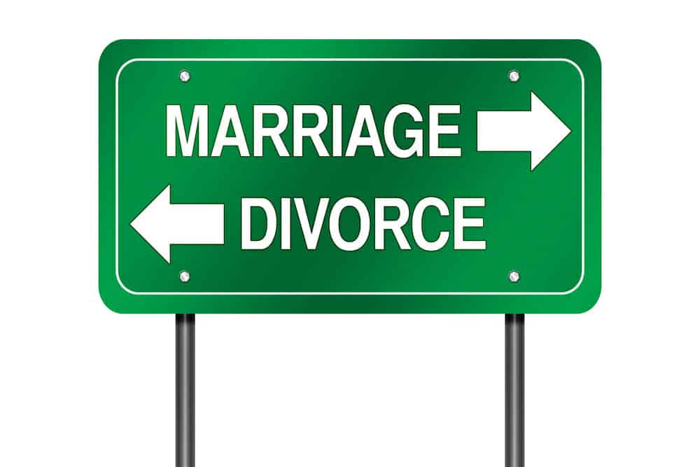 Sign with "Marriage" and "Divorce" pointing in opposite directions.