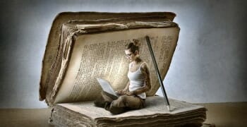 Picture of a woman reading on a laptop inside of a giant book held open by a pencil.