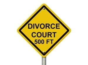 Yellow sign saying, "Divorce Court 500 Ft"