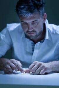 Young, handsome man depressed about being divorced