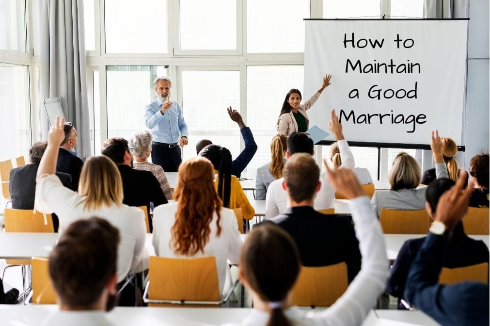 how to maintain a good marriage A group of adults in a classroom setting. The whiteboard has the words "How to Maintain a Good Marriage" written on them