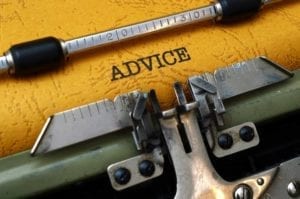 Close up of the word "Advice" typed on a typewriter. Marriage advice.