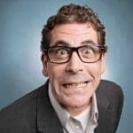 Stressed man with eyes bulging trying to survive his divorce hearing