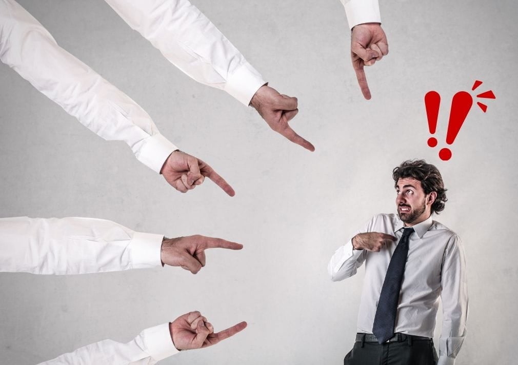 don't want to deal with it Several hands with fingers pointed to a man who is pointing to himself as if asking "Why me? Do I have to?"