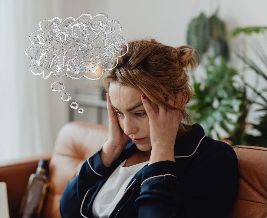 woman with a thought bubble signifying jumbled thoughts about her divorce
