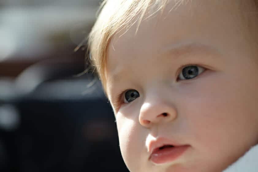 Close up of a blonde baby boy.