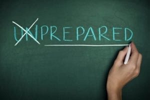Word "Unprepared" on a chalkboard, with a hand that put an "X" over the "un." You need to prepare for divorce.