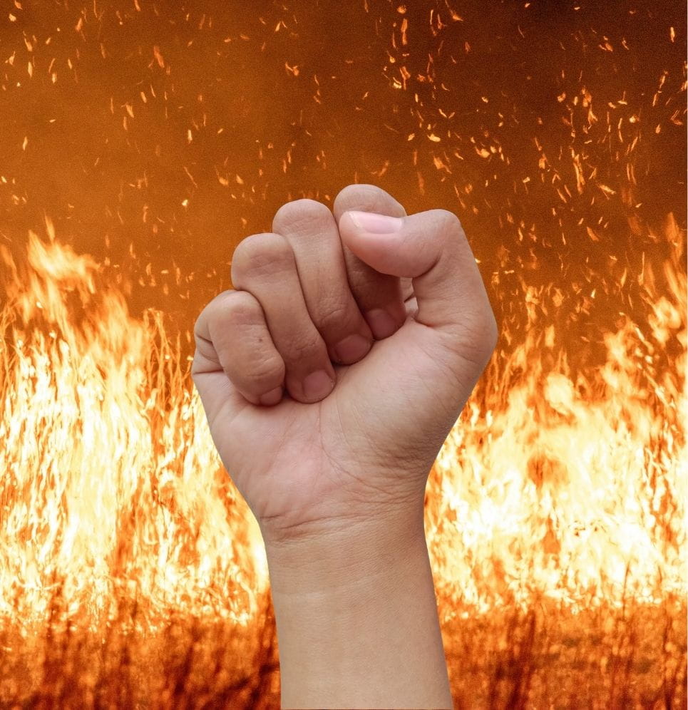 scorch and burn approach A raised fist surrounded by fire all around, symbolizing the scorch and burn approach