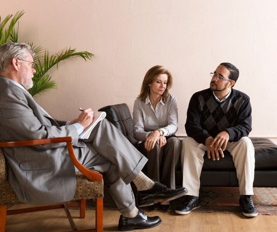 Older couple in therapy. Grey divorce counseling.