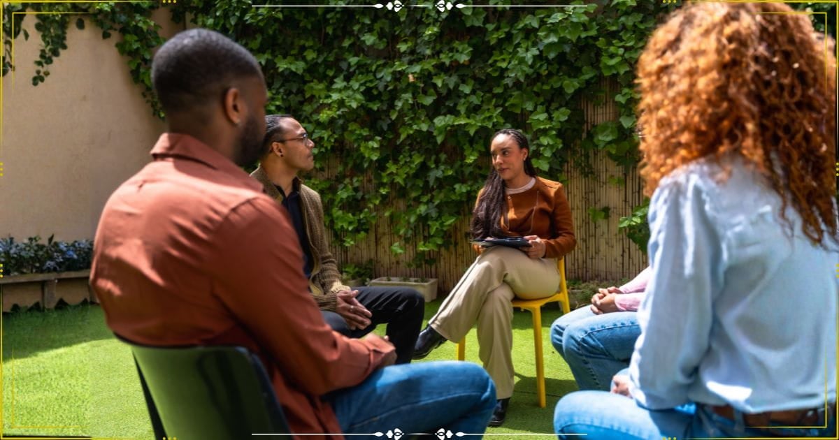 A support group sitting around in a cirlce