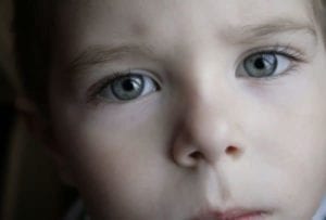 Close up of sad boy symbolizing Divorce and Children in Illnois