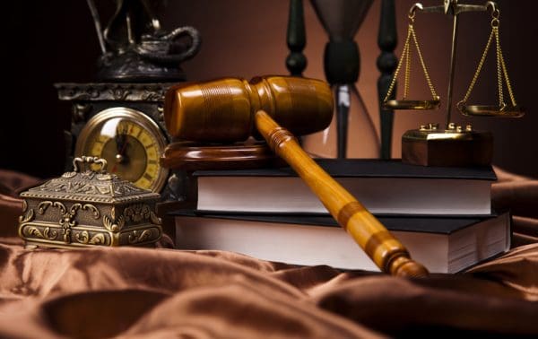 Illinois Divorce Process - Picture of law books, gavel, clock, scales of justice etc.