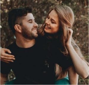 Smiling, young, happy couple with good communication in marriage