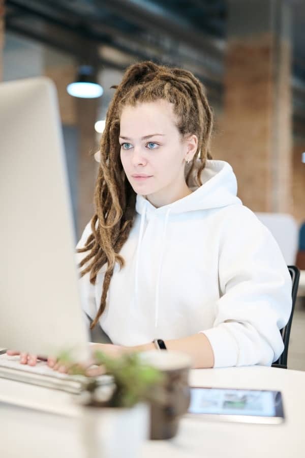 Beautiful woman on her computer preparing for divorce.