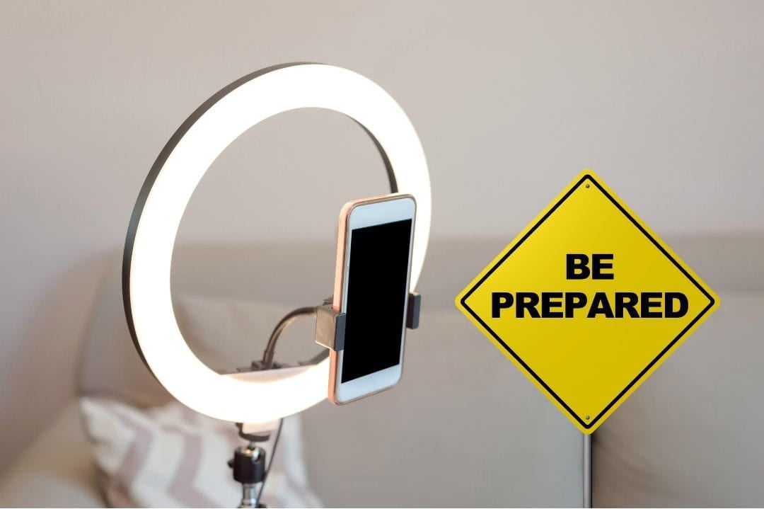 a ring light with a phone and a sign that says "be prepare". proper lighting at court