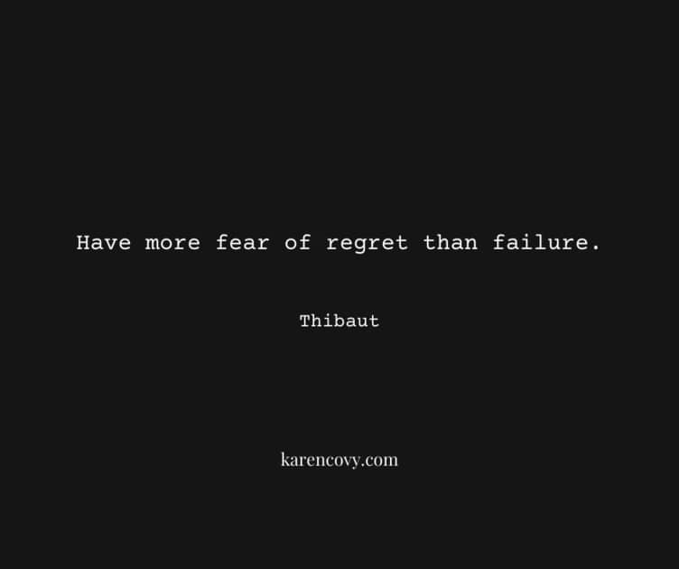 White type on a black bacground with saying, "Have more fear of regret than failure."