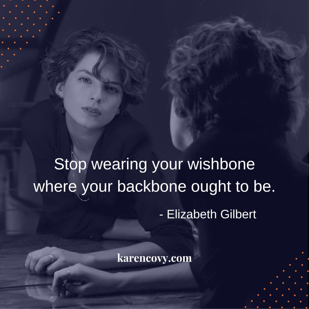 Woman looking in teh mirror at her reflection with the quote: Stop wearing your wishbone where your backbone should be.