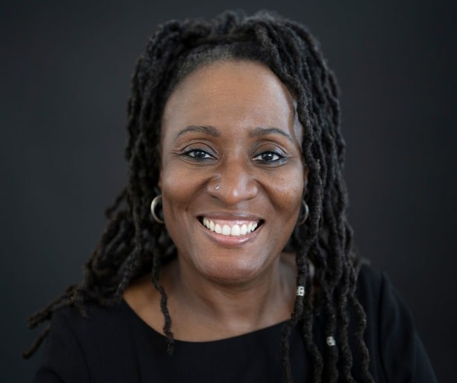 Smiling middle-aged African American woman.