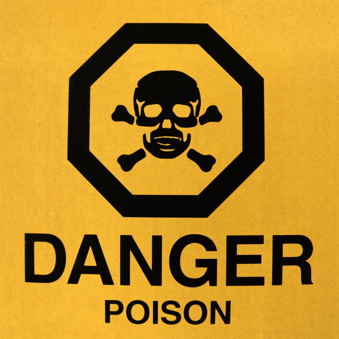 Yellow "danger poison" sign with skull and crossbones.