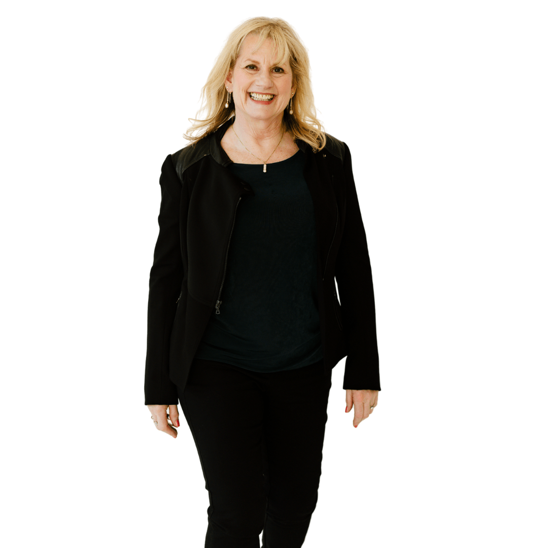 Karen Covy Karen Covy in a black suite walking.