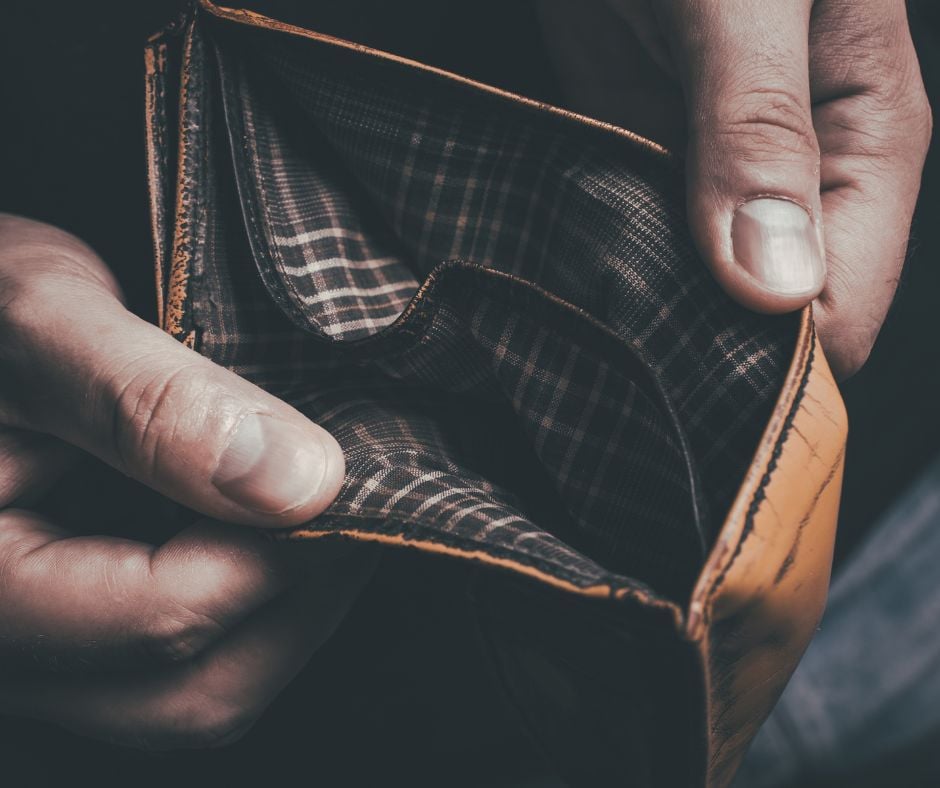 No Money Hands holding an empty wallet signifying "No money."