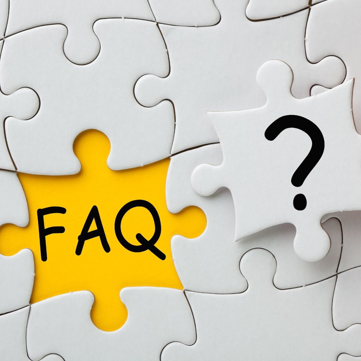 Divorce Coach FAQs White puzzle missing a piece with yellow underneath showing "FAQ." Divorce coach FAQs are the missing piece.