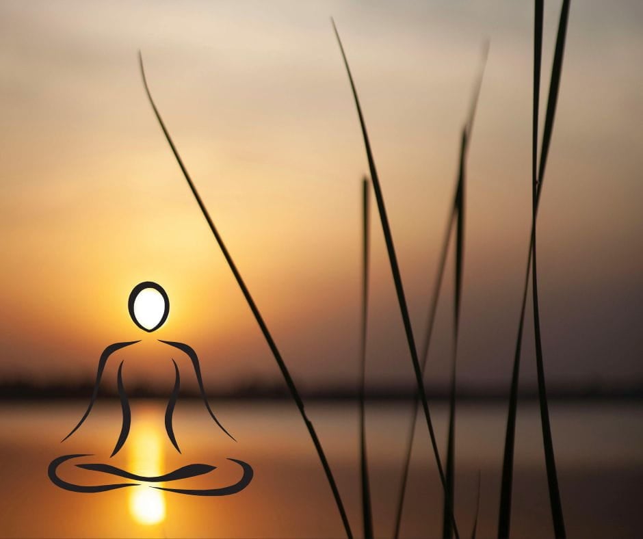 Make Peace Zen figure superimposed over a sunset on a lake.