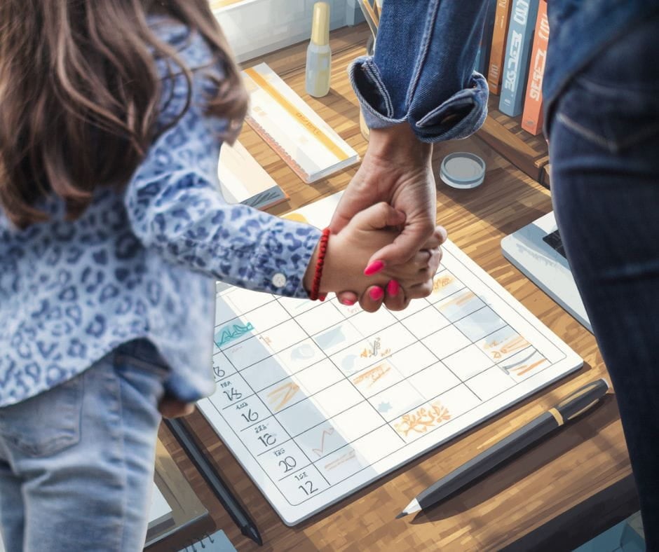 Hands of mother and daughter superimposed over a parenting time schedule.