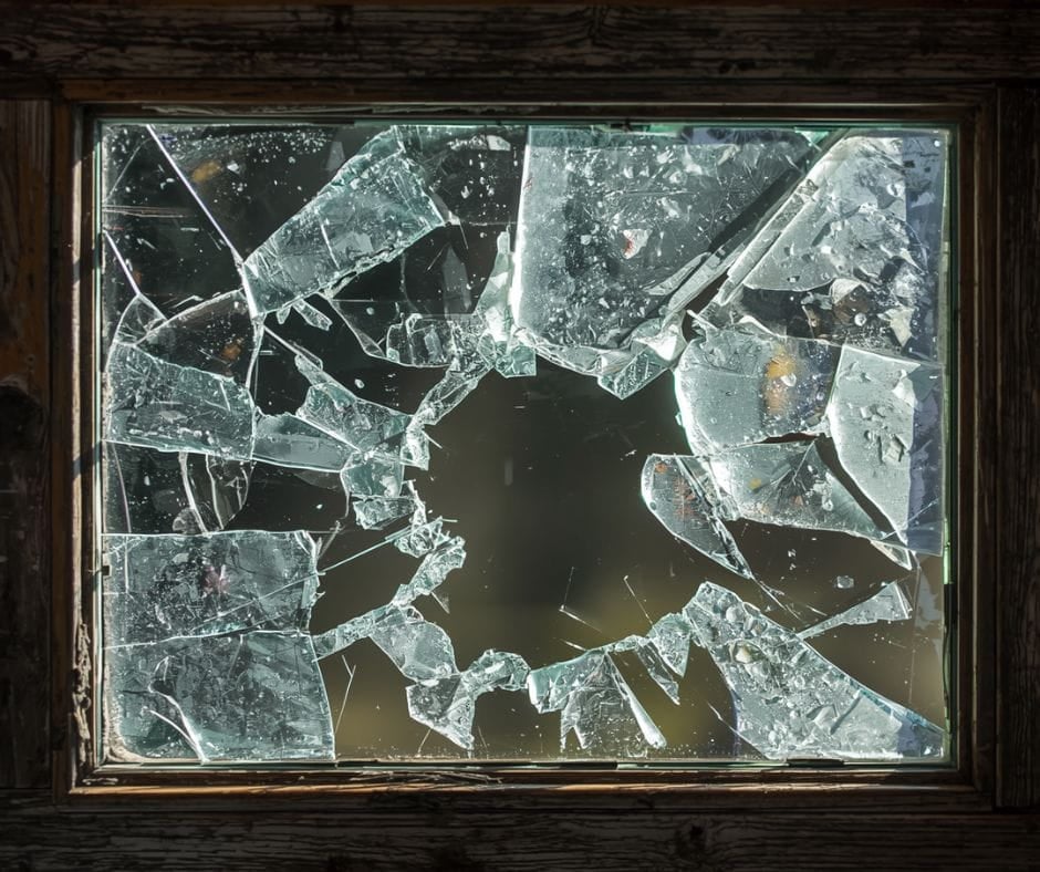 AI image of a shattered pain of glass.
