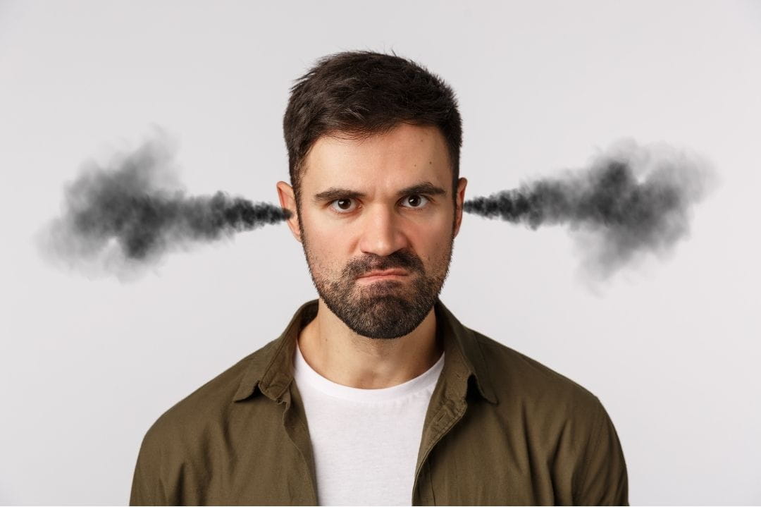 man with steam coming out of his ears