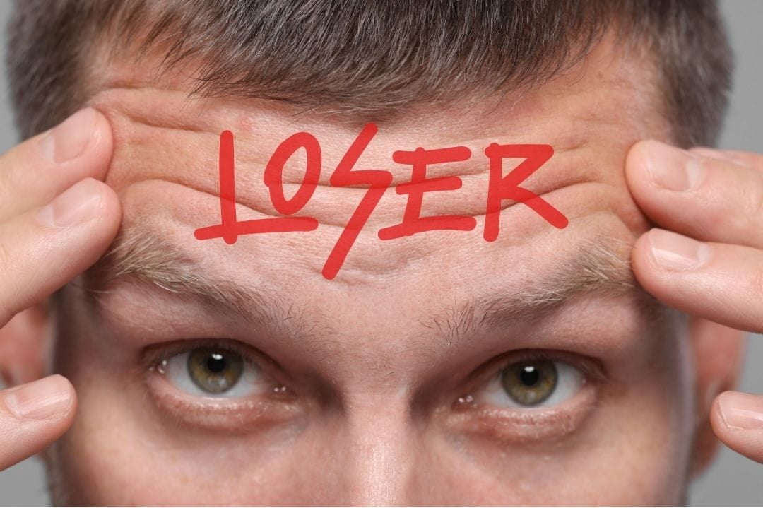 man with loser stamped on his forehead man with loser stamped on his forehead