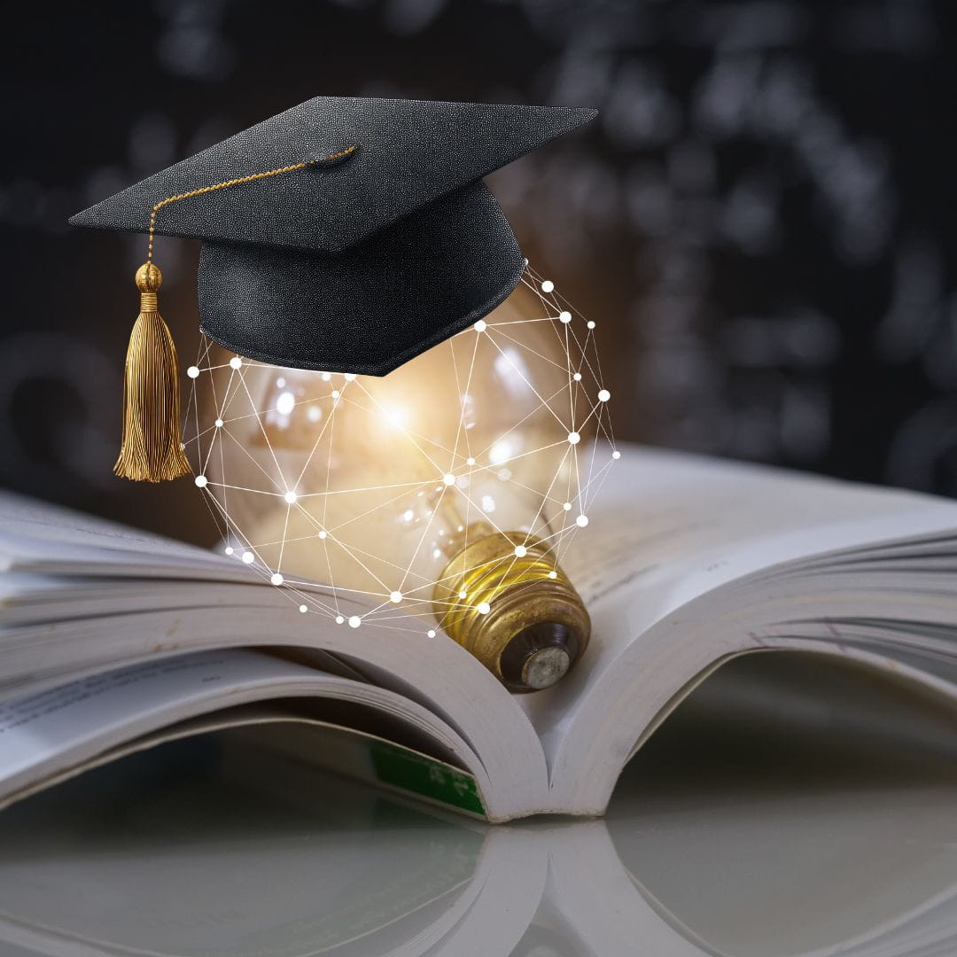 Educate Yourself About Divorce LIght bulb and graduation cap on an open book. Educate yourself about divorce.