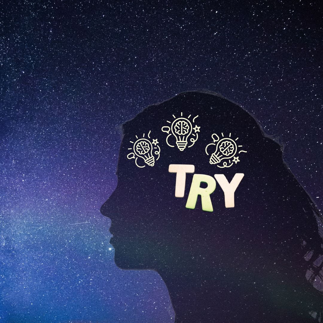 Silhouette of a woman with stars in the background and lightbulbs in her head. Signifies "try new things."