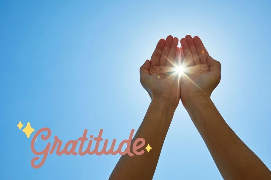 hands held out, cupping the sun. gratitude